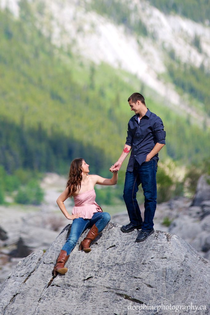 Cute Couple Holding Hands At Their Engagement Pictures In Jasper National Park 