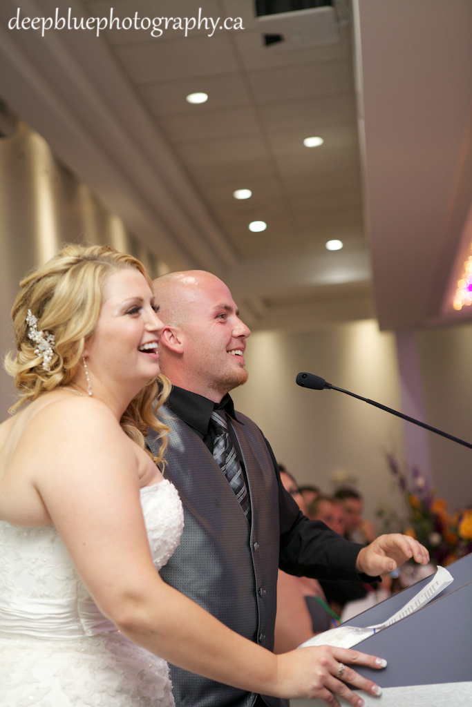 Photo of Bride and Groom Giving Speech At Their Chateau Louis Hotel Wedding