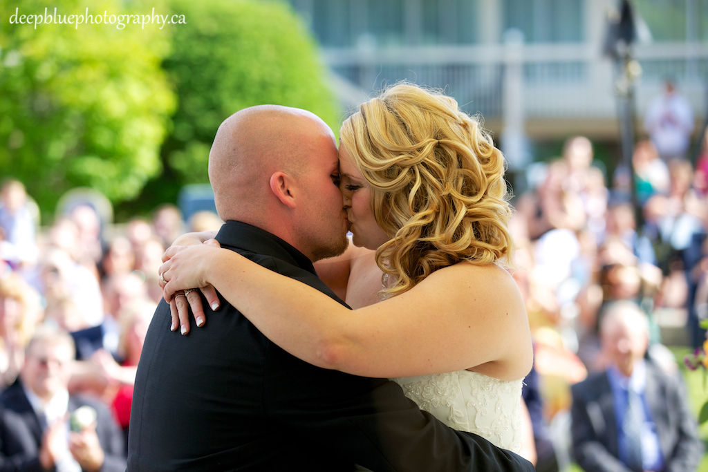 Bride and Groom Share First Kiss At Their Chateau Louis Hotel Wedding