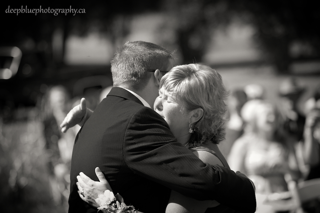 Tyler and his Mother Hugging at the Ceremony