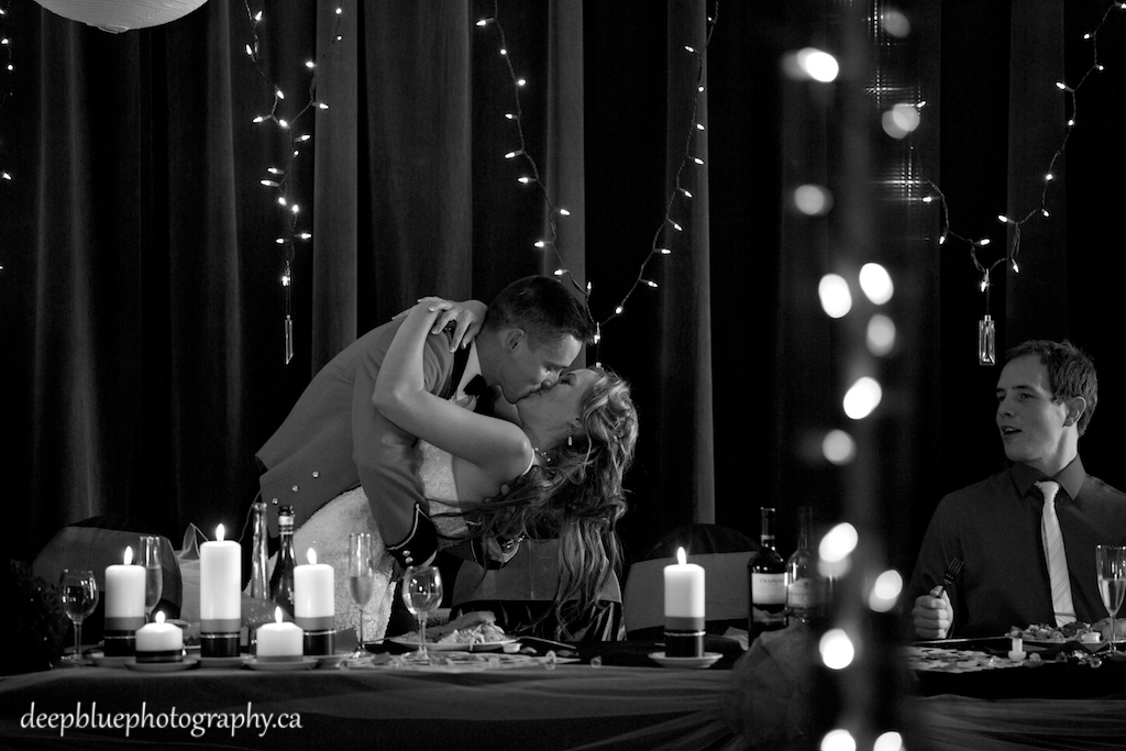 Bride and Groom Share a Kiss