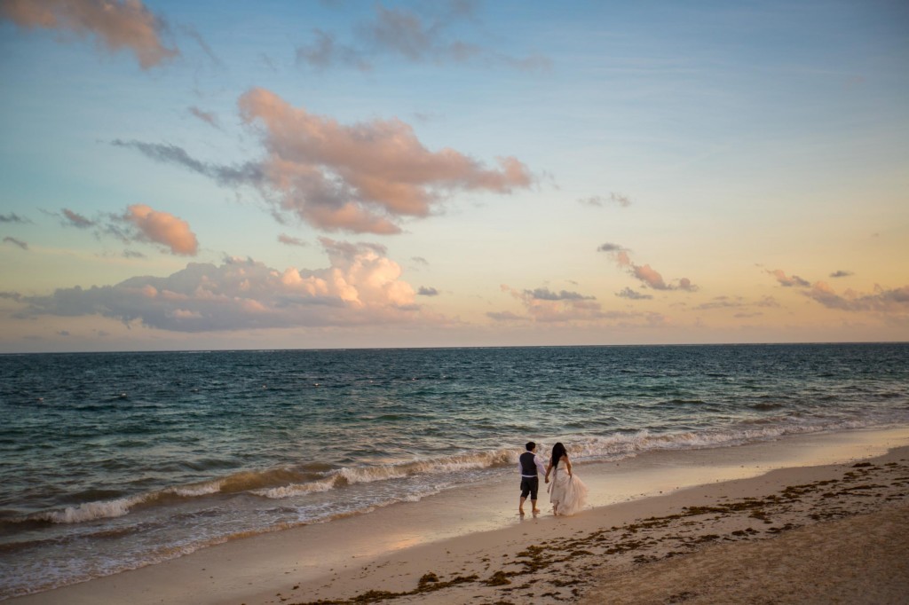 How to Plan a Destination Wedding - Sunset Picture Of Bride And Groom On Beach