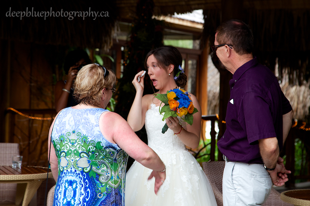 Photo of the Bride Meeting Her Parents At A Destination Wedding In Tahiti 