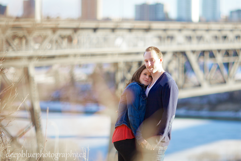 Couple Holding Hands During Their High Level Bridge Engagement Photos
