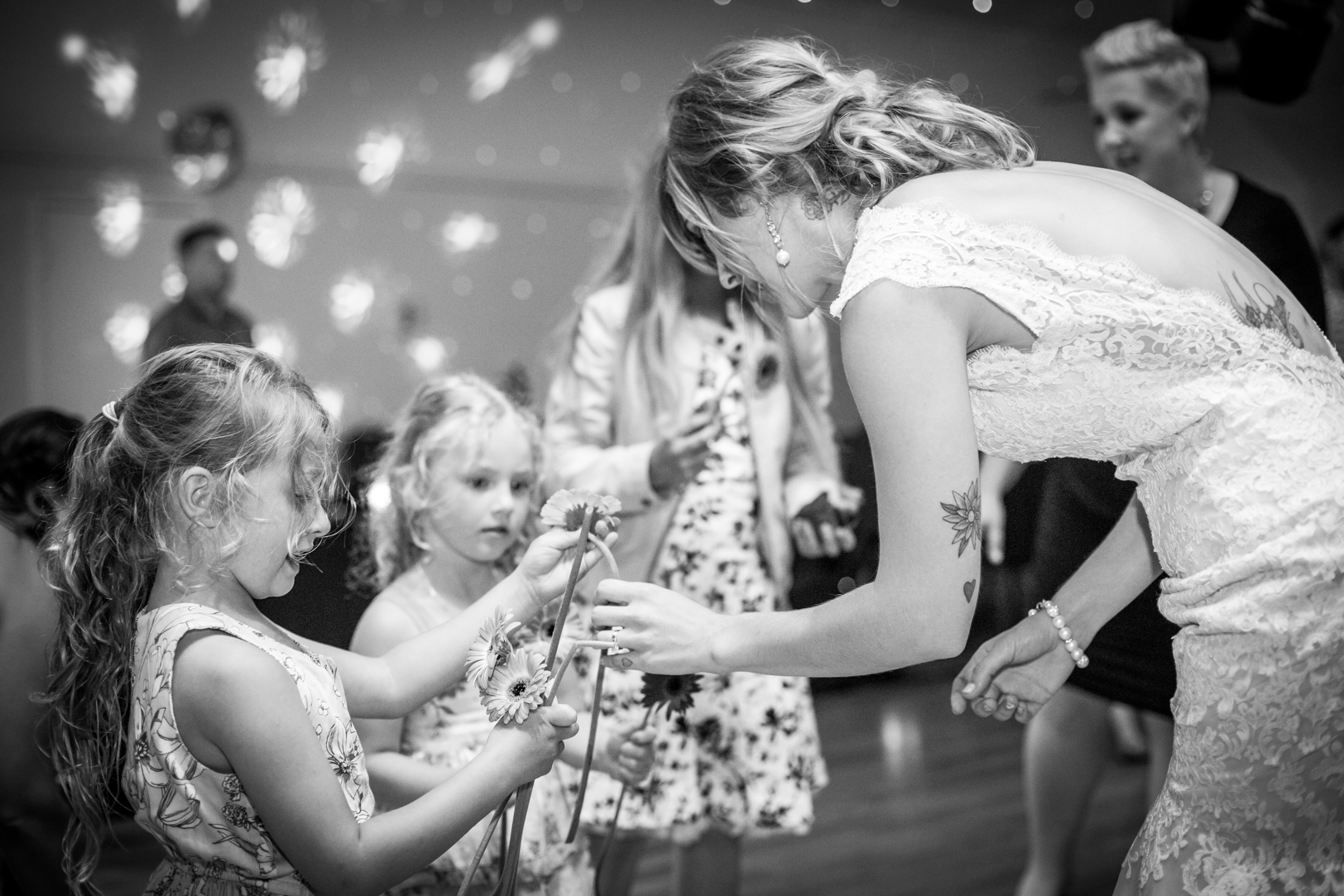 Bride Handing Out Flowers