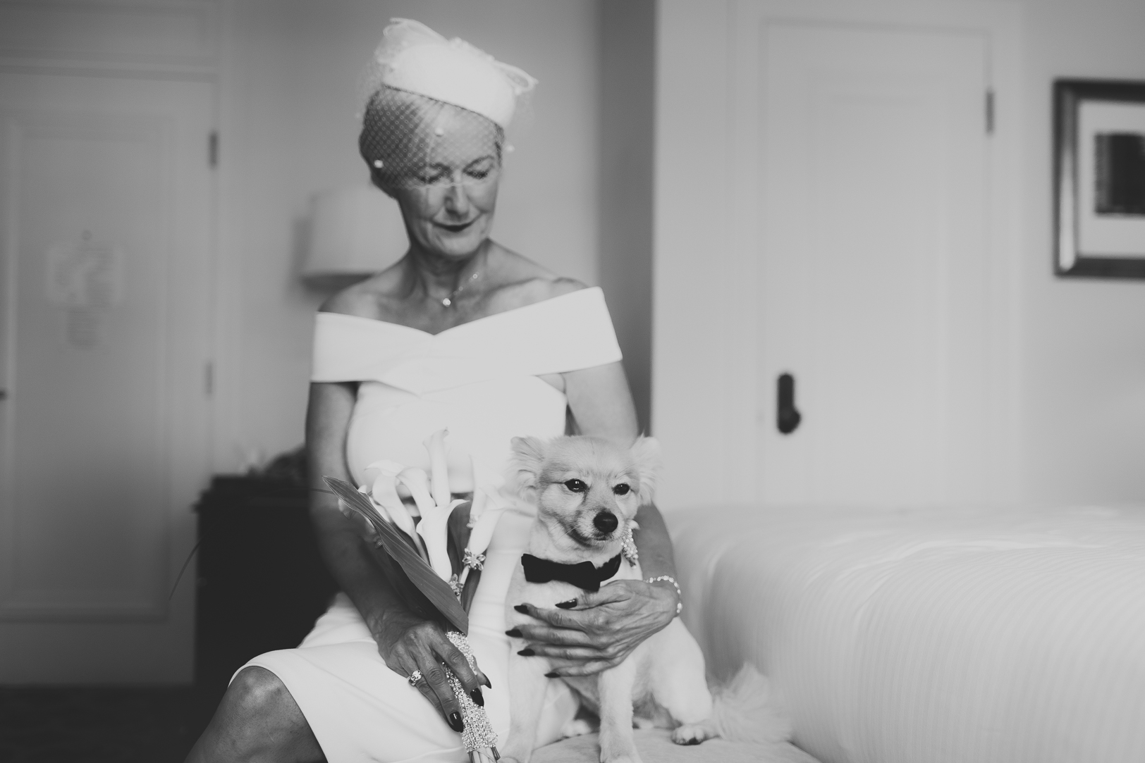 Photo of Bride and her Dog - Fairmont Hotel MacDonald Wedding.