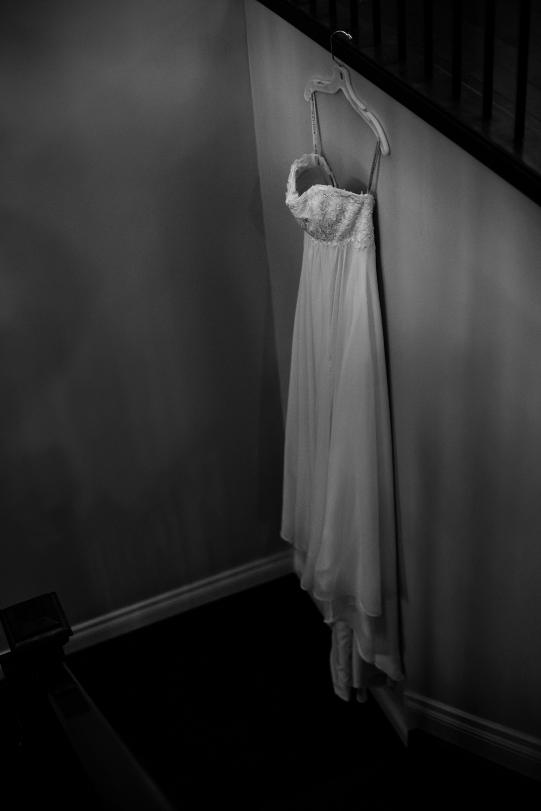 Photo of Wedding Dress Hanging Up