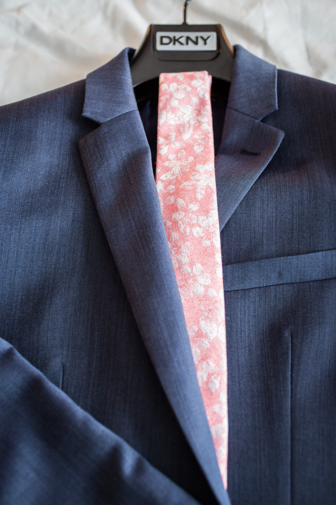 navy and pink wedding suit