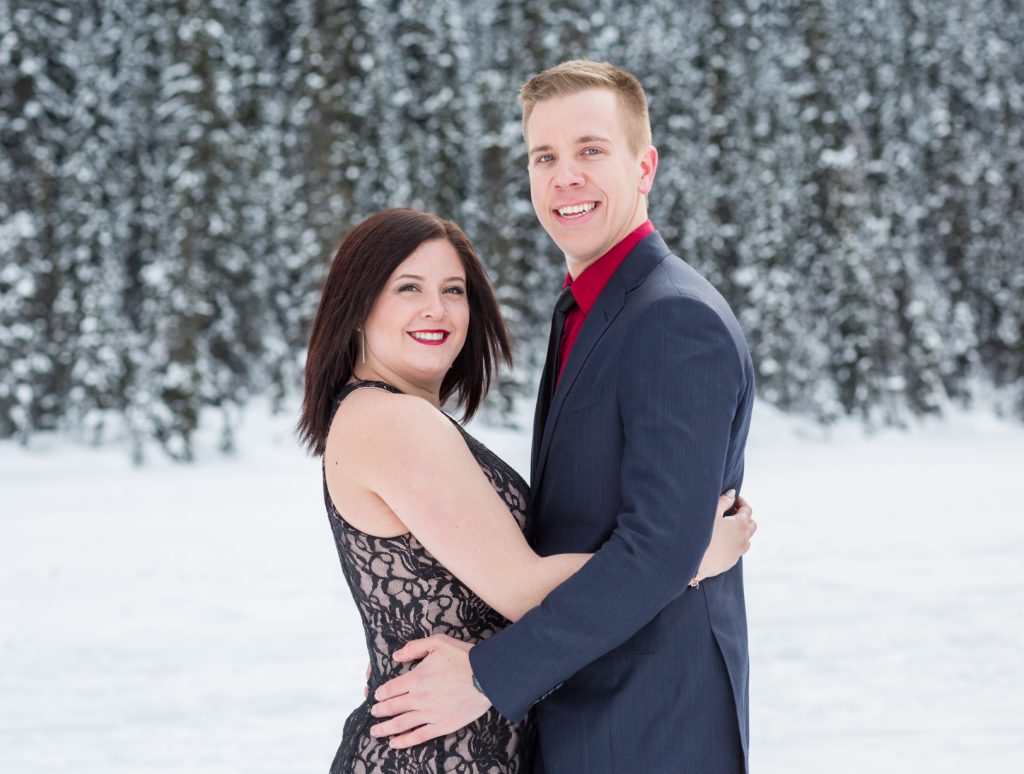 Couple standing for formal engagement photos - Mountain Engagement Photography by Deep Blue Photography