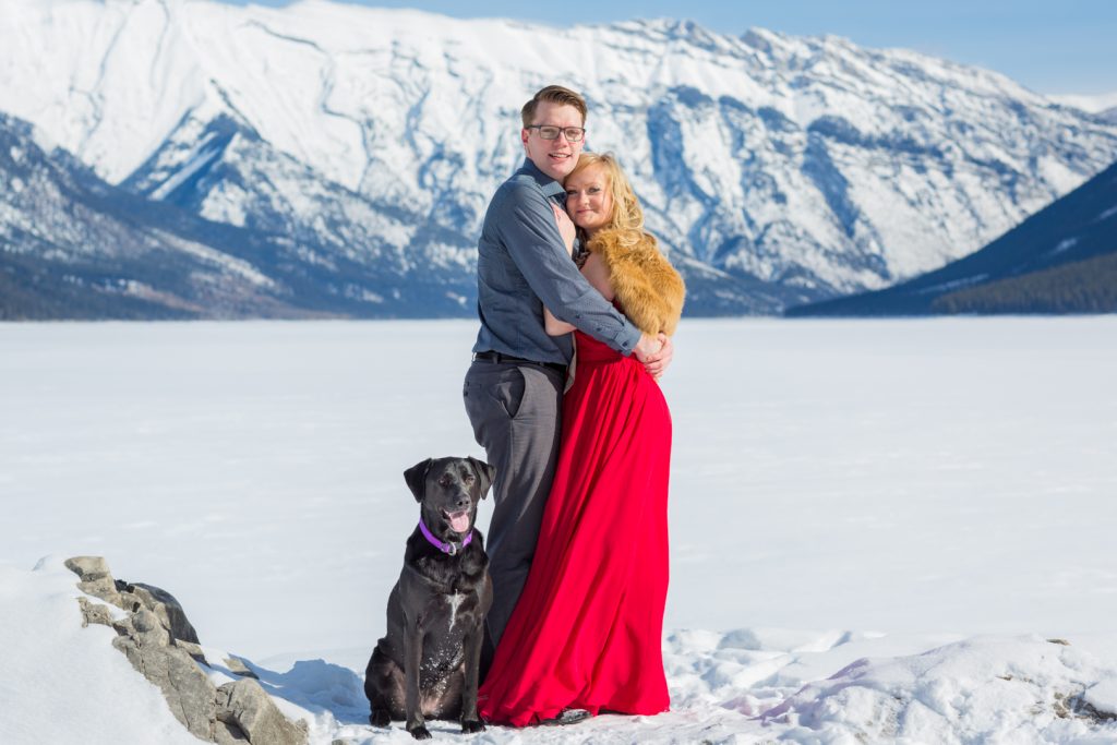 winter engagement photos in banff with dog