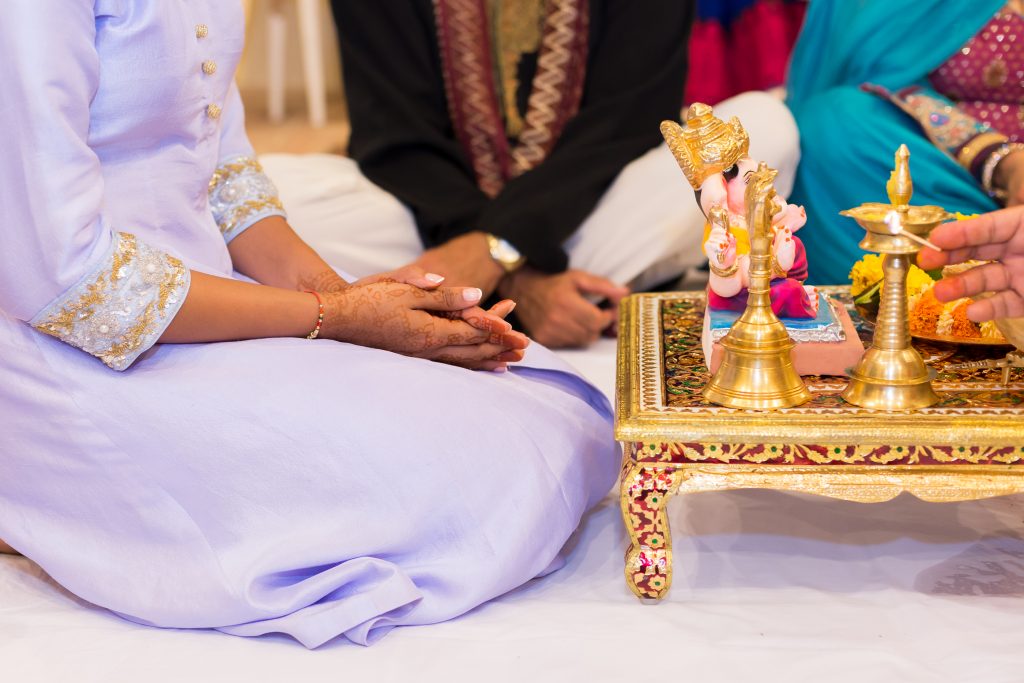 Photo of the bride to be sitting in preparation for the Choora ceremony