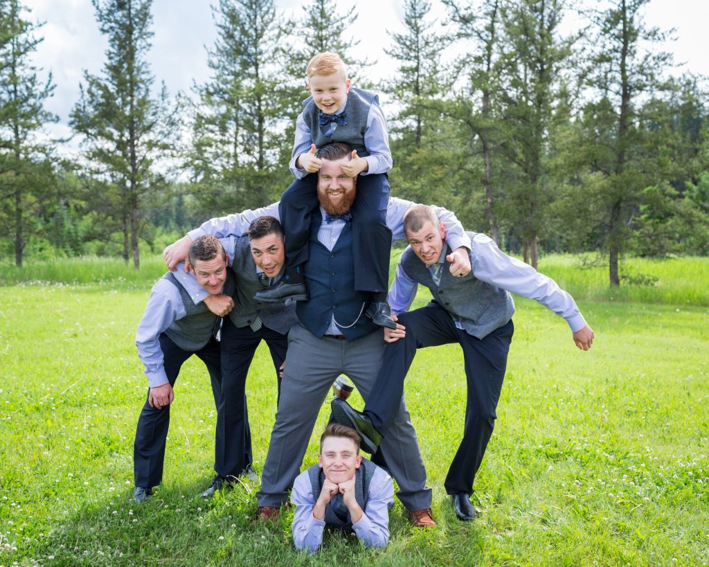 Groomsmen group photo taken at Snow Valley after the wedding ceremony