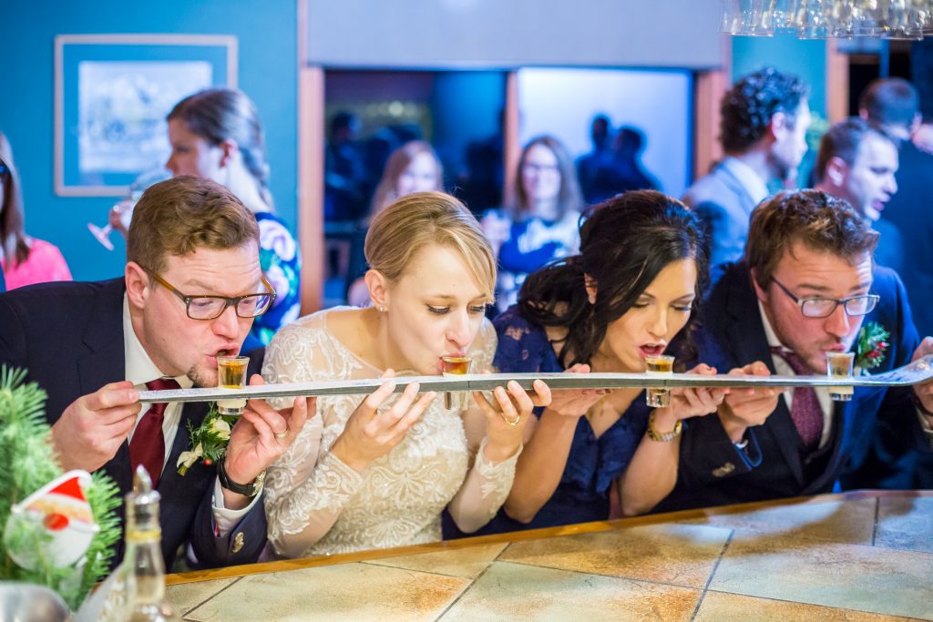 Wedding party with a shot-ski during wedding reception at Pyramid Lake Lodge