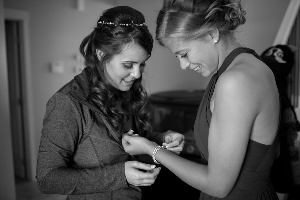 bride and sister in law getting ready