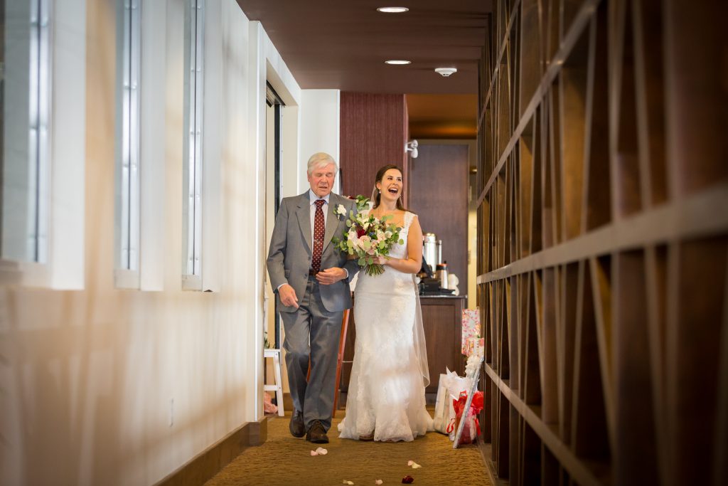bride and her father before ceremony
