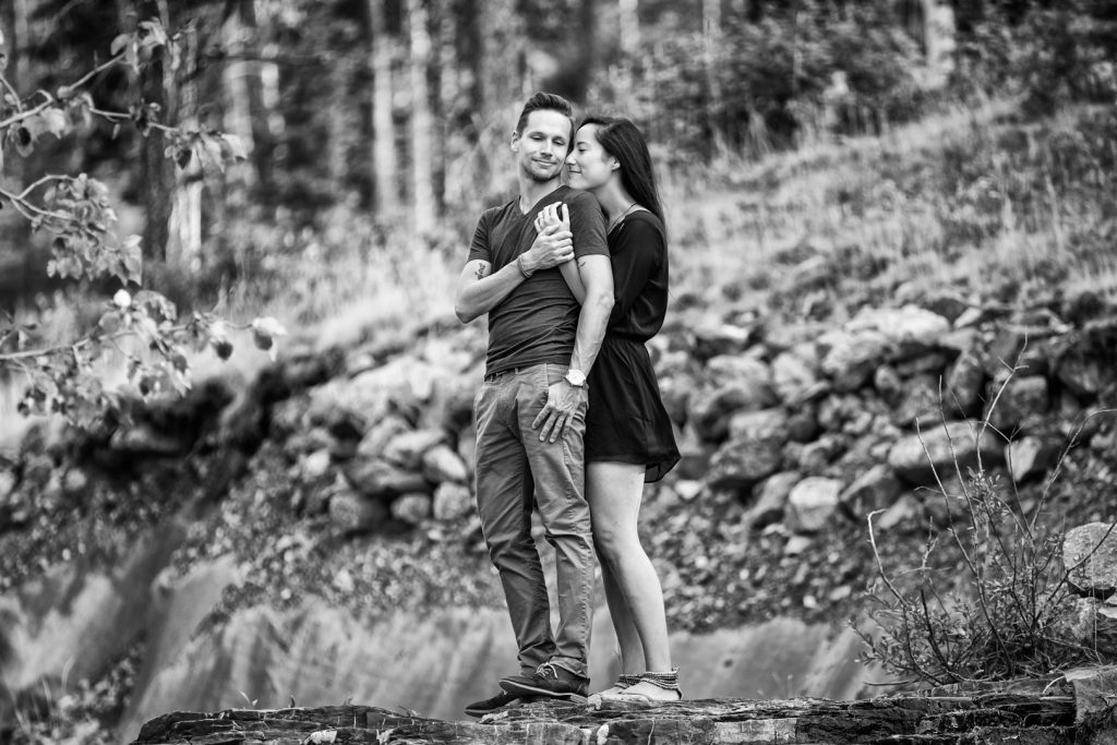 Canmore engagement pictures on a waterfall