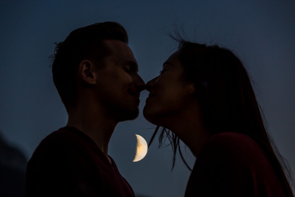 Canmore engagement pictures with the moon