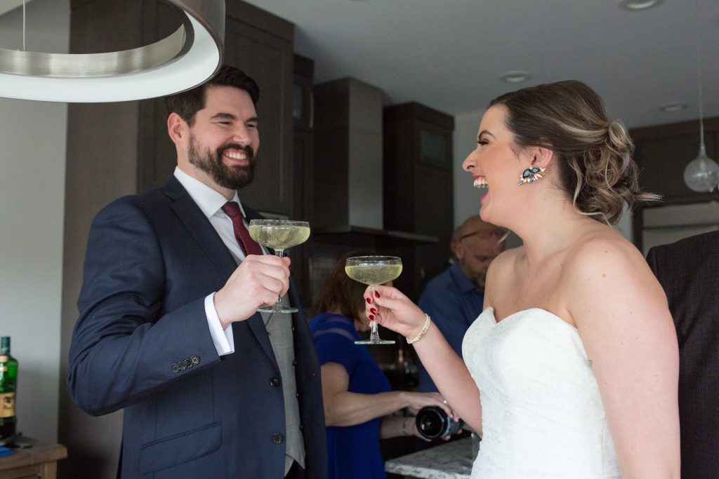 bride and groom champagne toast